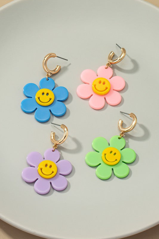 Huggie hoop dangling flower smiley face earrings